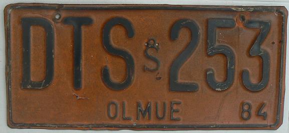 Old series (1981 - 1984), black on orange = private vehicles, Olmue district (Valparaíso province), 1984 issue