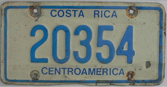 Current normal series (1979 up), blue on white = passenger cars, five digit serials issued in early 1980s 