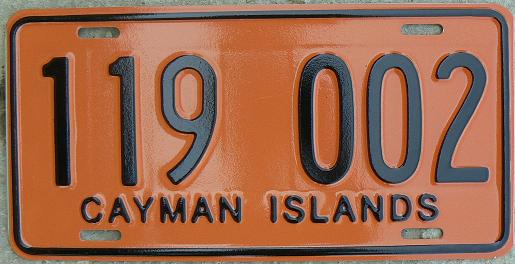 Current normal series (1974 up), black on orange = trucks or trailers, 119 nnn block issued in 2000s