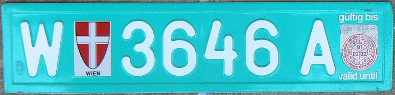 Current temporary series (1990 - ), W = Wien, white on green = temporary registration for up to three weeks, the seal at the right indicates the date of expiry (in this case 6 Dec 2001)