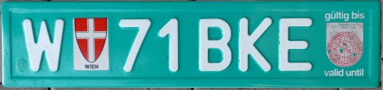 Current temporary series (1990 - ), W = Wien, white on green = temporary registration for up to three weeks, the seal at the right indicates the date of expiry (in this case 23 May 2013)