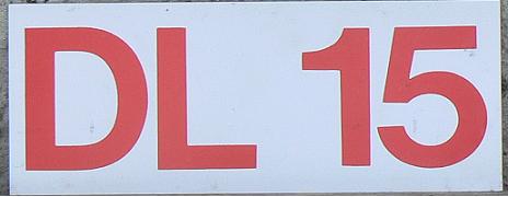 Old dealer series (1956 - 2001), DL = Dealer Licence, 15 = the number allocated to the particular dealer, made of paper