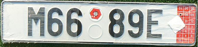 Current temporary plates used for vehicles leaving the country forever - export plates (ca.2003 up)  M = Olomoucký kraj (Olomouc), E = export, expiry date at right (January 2007), trailer plate