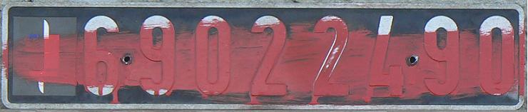 Former military series (1980-2009), sword on tricolour = army (1990 - ), 6 (1st digit) = army, 90 (2nd and 3rd digit) = year of registration / 1990, 2 (4th digit) = type of the vehicle / van  (This plate was officially depreciated by red colour when derigestering the vehicle.)