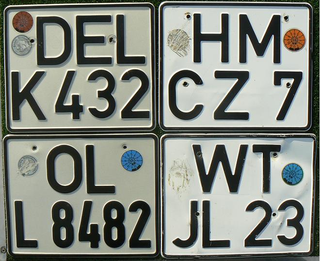  Former normal series (1956 - 1994), rear plates (motorcycle "middle" size)  DEL = Delmenhorst, HM = Hameln-Pyrmont (Hamelin), OL = Oldenburg, WT = Waldshut