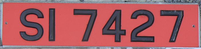 Former normal series (1921 - 1986), type 1 (the two letter code, up to four numerals), rear plate (optional black on red since December 1969), SI = Dublin (1986)
