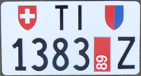 Current temporary series (1960 - ), rear, TI = Ticino (Bellinzona), Z = Zoll (duty has not been paid), year of expiry 1987