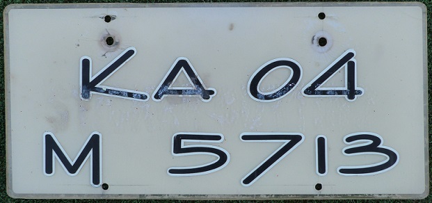 Current normal series (2002 up), black on white = privately used vehicle, KA = Karnataka State (Bangalore), 04 = Bangalore-Yeshwanthpur district,  M = private car