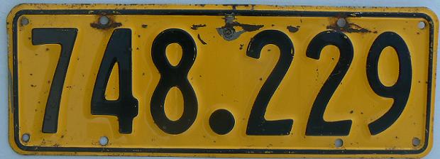 Old normal series, black on yellow and period as a separator = 1961-66 series